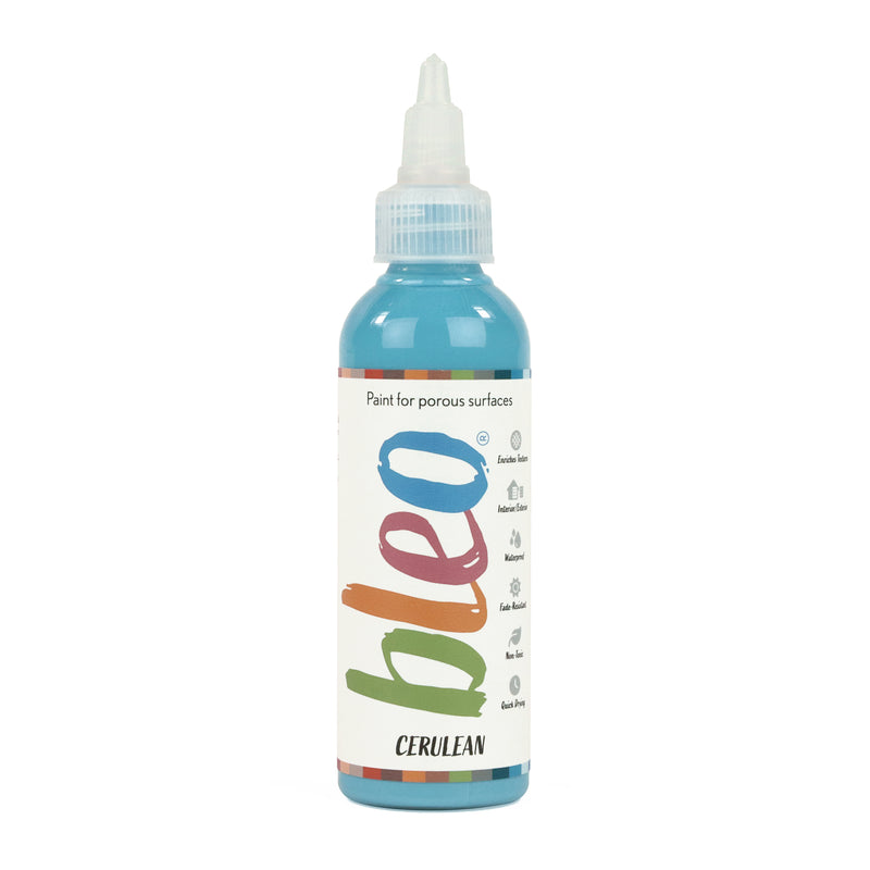 A bottle containing coloured gel paint, on a white background of bleo cerulean