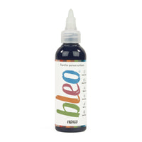 A bottle containing coloured gel paint, on a white background of bleo indigo
