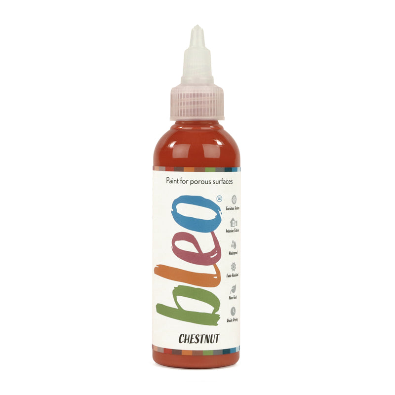 A bottle containing coloured gel paint, on a white background of bleo chestnut