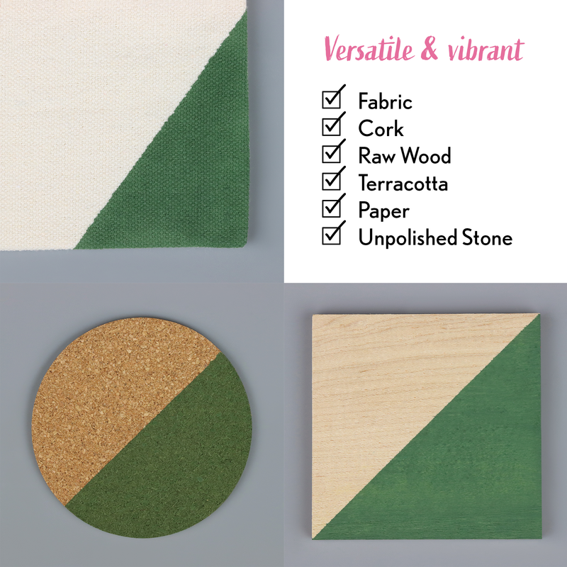 Geometric shapes made from fabric, cork, raw wood, terracotta, paper, and unpolished stone on a gray background.