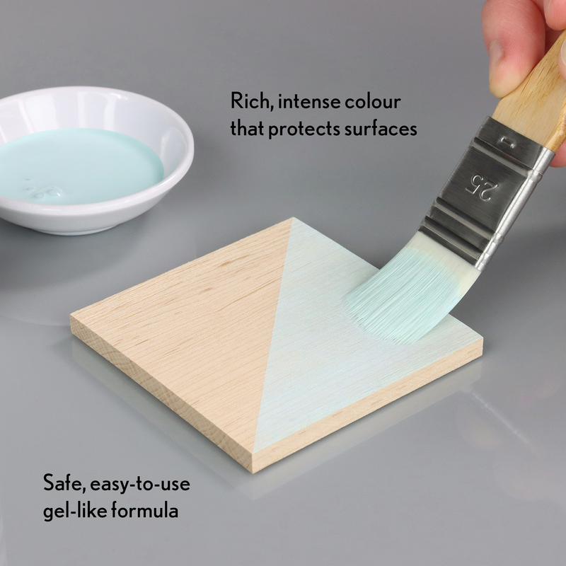 Person applying a gel-like substance to a wooden block with text describing its properties.