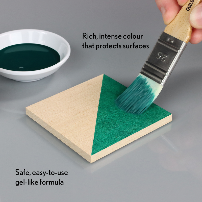 Green paint being applied to a wooden surface with text describing the product's features.