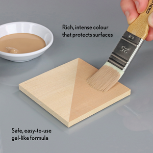 
                      
                        Paintbrush applying a gel-like substance to a wooden block with text describing its properties.
                      
                    