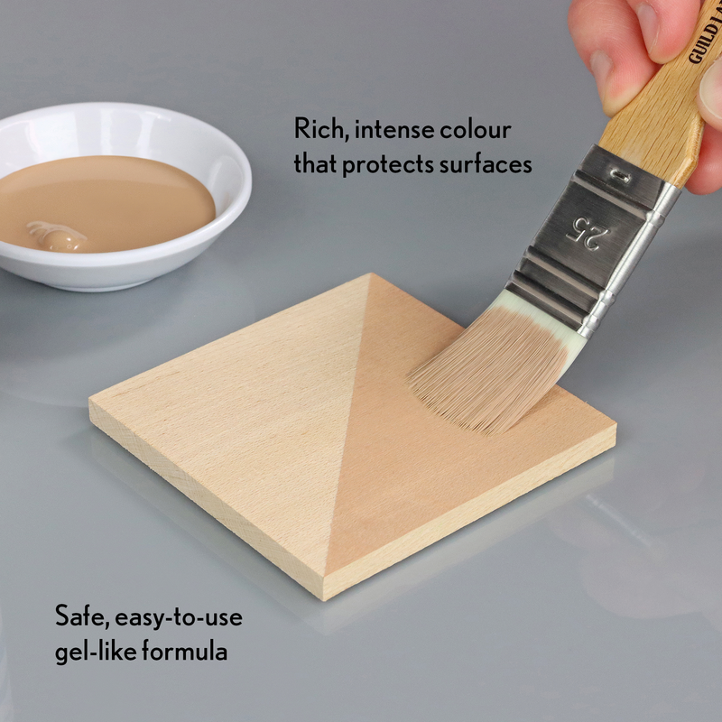 Paintbrush applying a gel-like substance to a wooden block with text describing its properties.