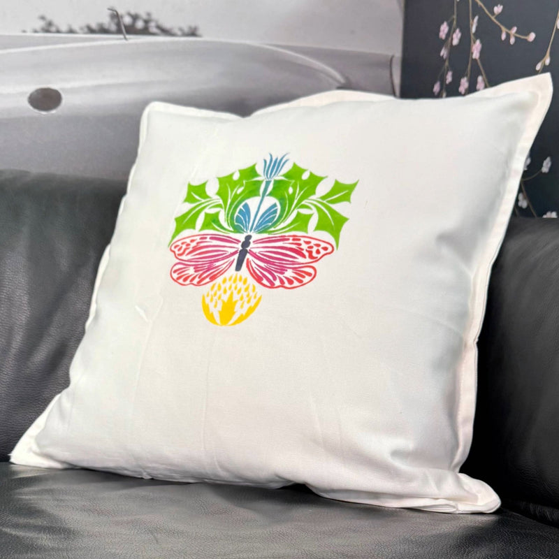 Canvas cushion painted in pink and green fabric paint