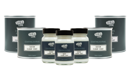 Set of Guild Lane top-coat jars on a white background