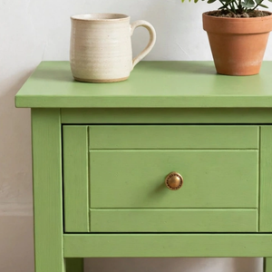 
                      
                        Close up corner of an eau de nil painted piece of furniture
                      
                    