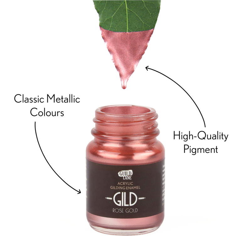 Leaf dipping into a jar of Rose gold metallic paint