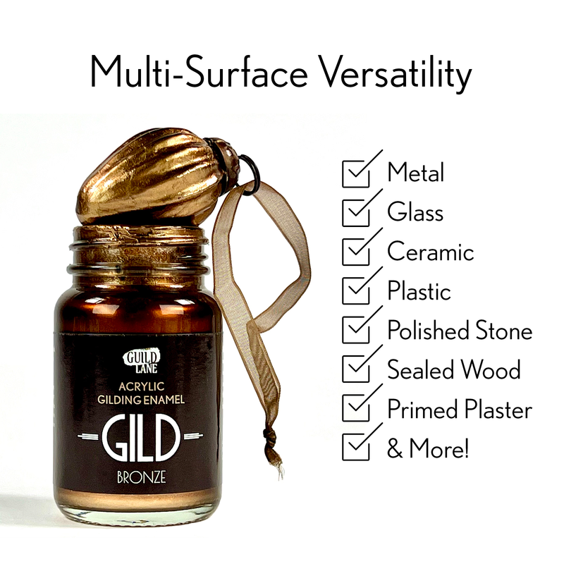 Bottle of GILD acrylic gilding enamel with gold leaf and text highlighting multi-surface versatility.