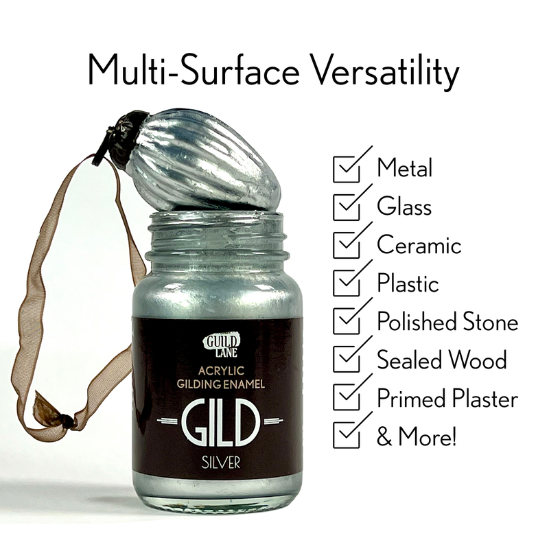 Silver gilding enamel bottle with 'GILD' branding and text highlighting multi-surface versatility on a white background.