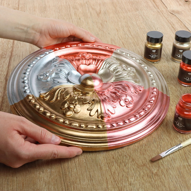 Plaster ceiling rose painted in all five GILD Originals shades