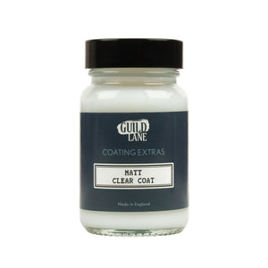 A jar of 'Guild Lane Coating Extras' Matt Clear Coat, indicating it's a matte finish coating.