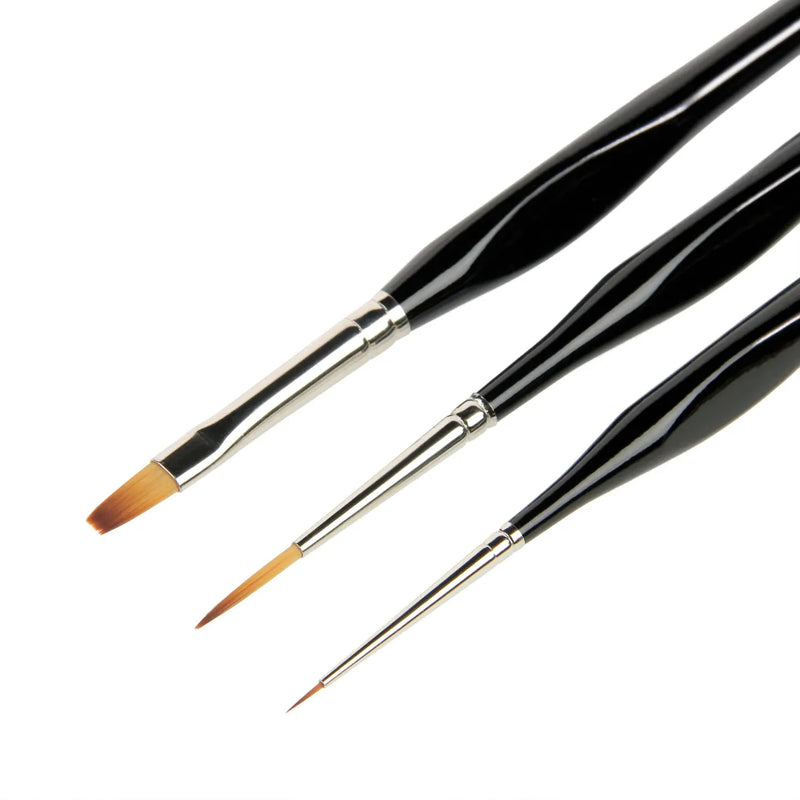 Three paintbrushes with black handles on a white background