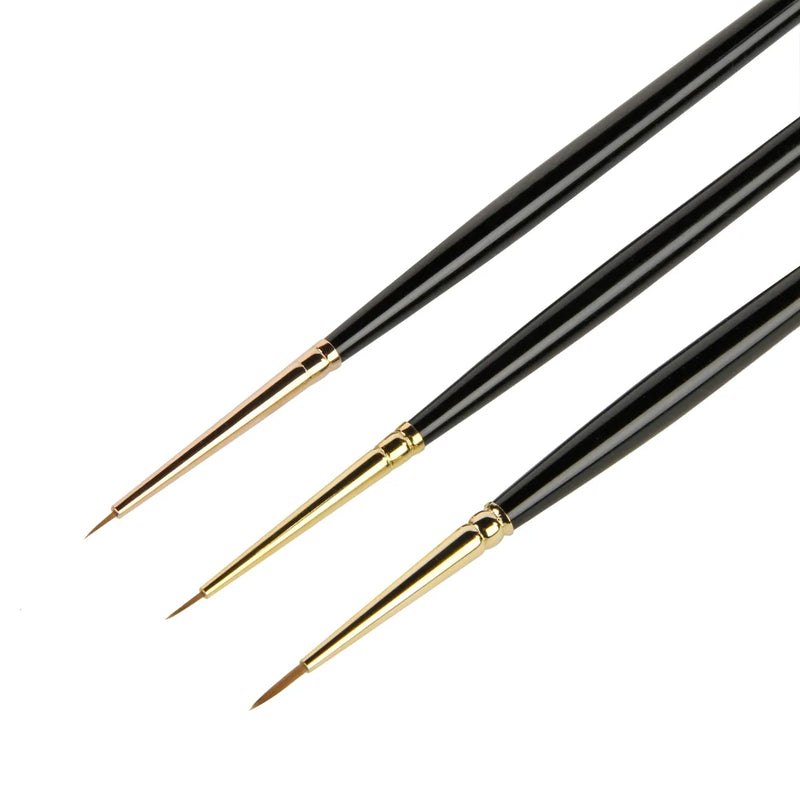Three paintbrushes with black handles and gold ferrules on a white background