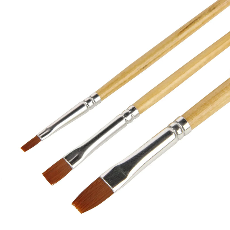 Three paintbrushes with wooden handles and brown bristles on a white background