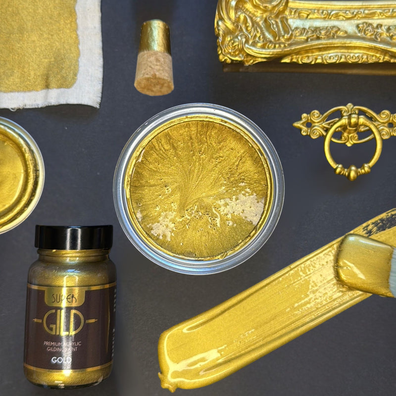 Super GILD Gold metallic painted items and materials on a dark surface