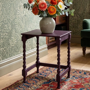 
                      
                        Deep plum purple small barley twist side table with a vase of flowers on top
                      
                    