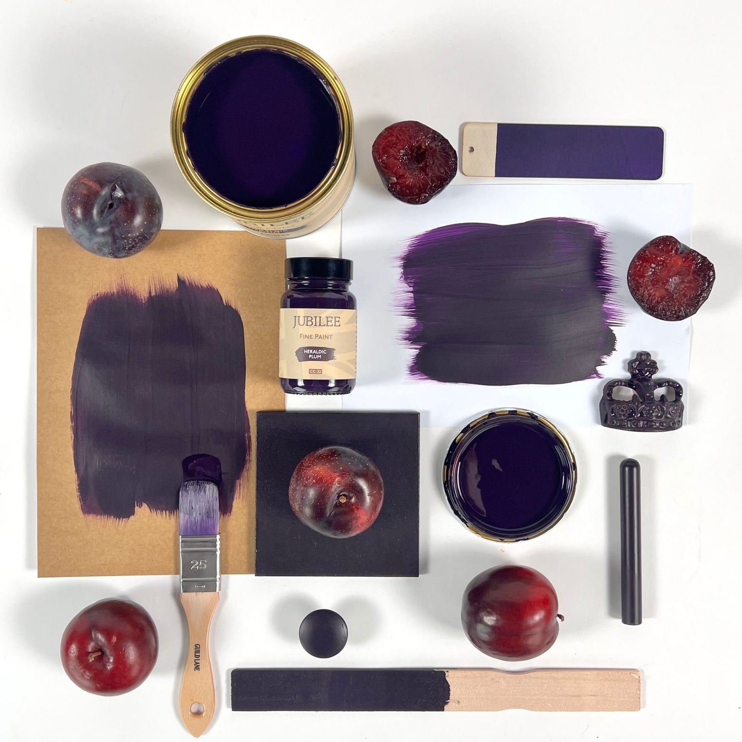 heraldic plum flatlay