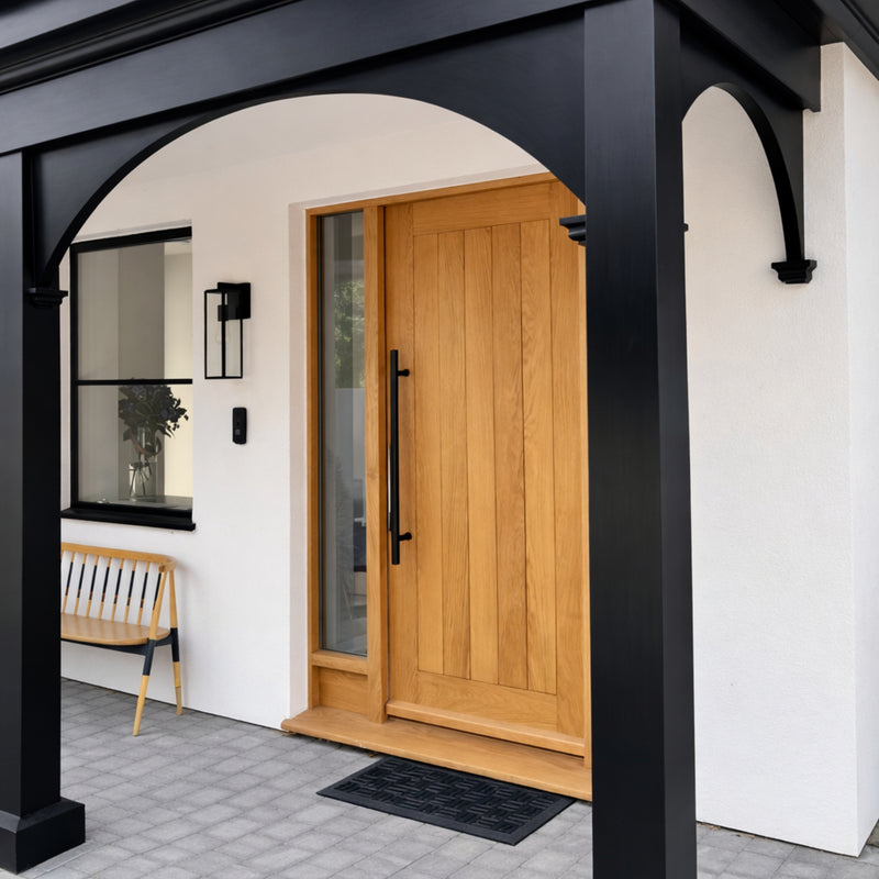 Black wood and masonry paint painted on an English porch cover archway