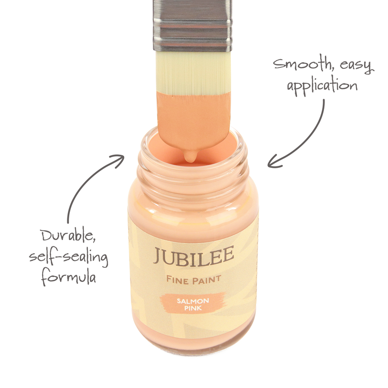 An annotated jar of salmon pink paint with product features