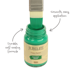 
                      
                        Bottle of Jubilee Fine Paint with a brush dipping into it, labeled for smooth application and durable formula.
                      
                    