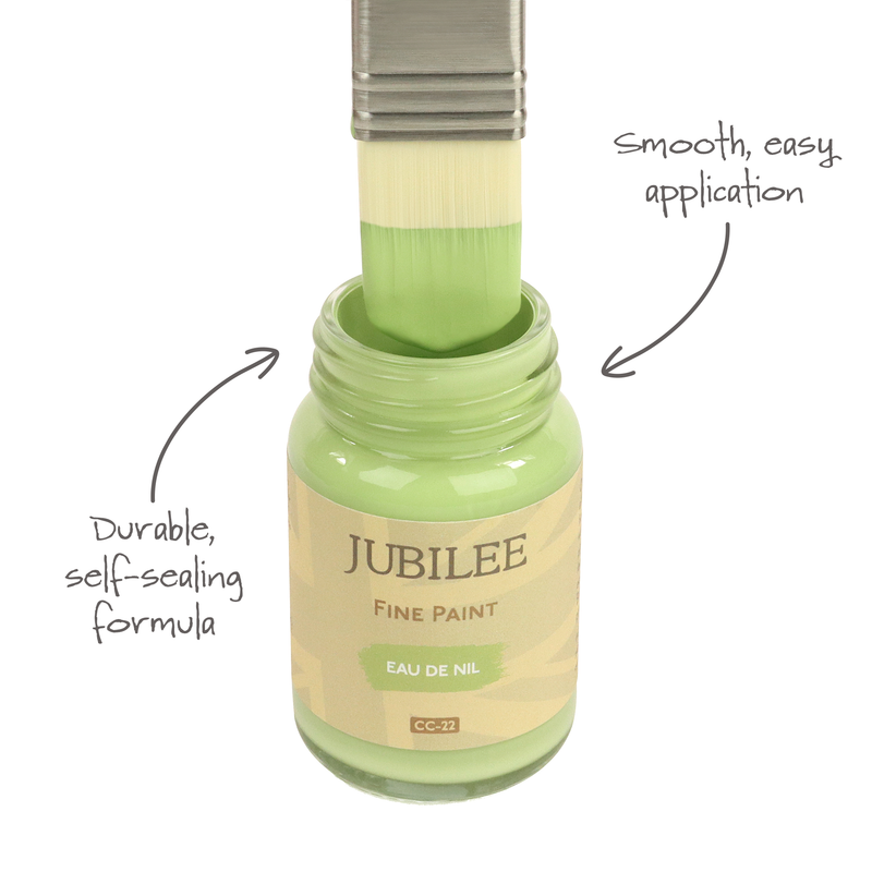Bottle of Jubilee Fine Paint with a brush applying paint, labeled for smooth application and durable formula.
