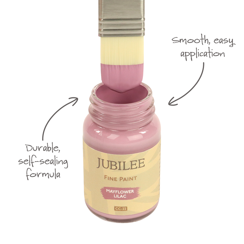 Jubilee Fine Paint bottle with a brush dipping into the paint, labeled 'Mayflower Lilac'.