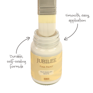 
                      
                        Jubilee fine paint bottle with brush applicator on a white background
                      
                    