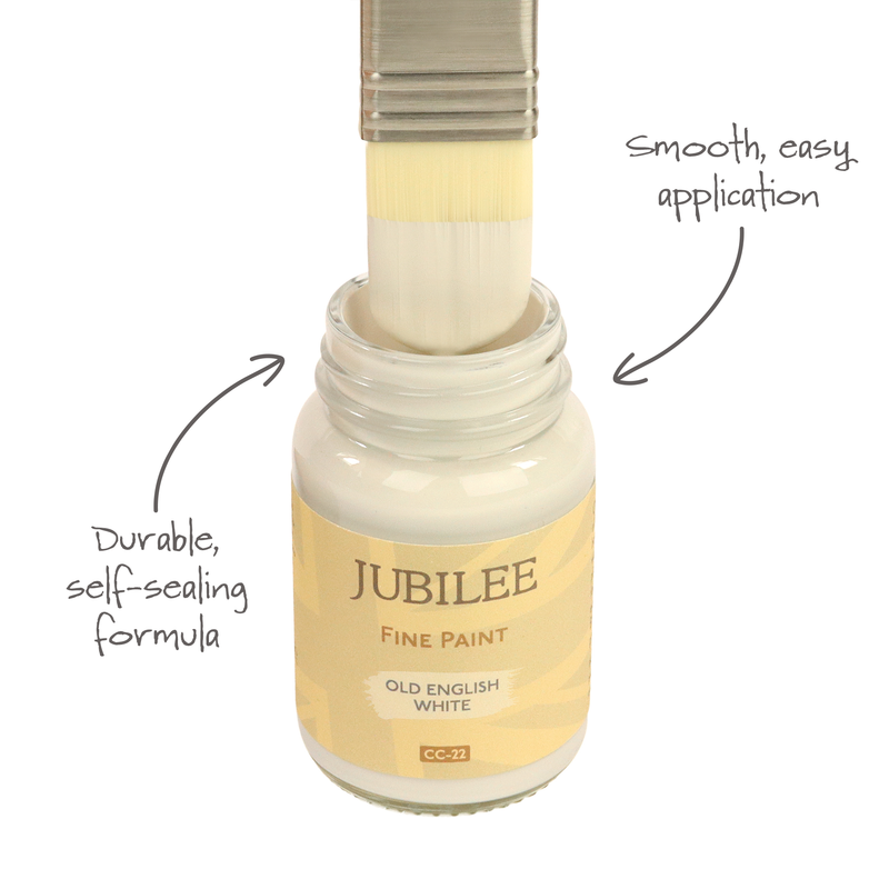 Jubilee fine paint bottle with brush applicator on a white background