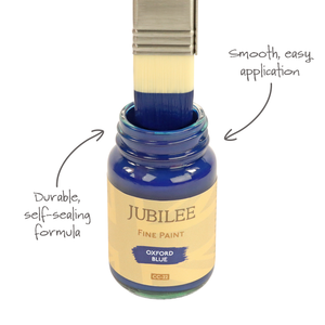 
                      
                        Jubilee Fine Paint jar with a brush dipping into it, labelled 'Durable, self-scaling formula' and 'Smooth, easy application'.
                      
                    