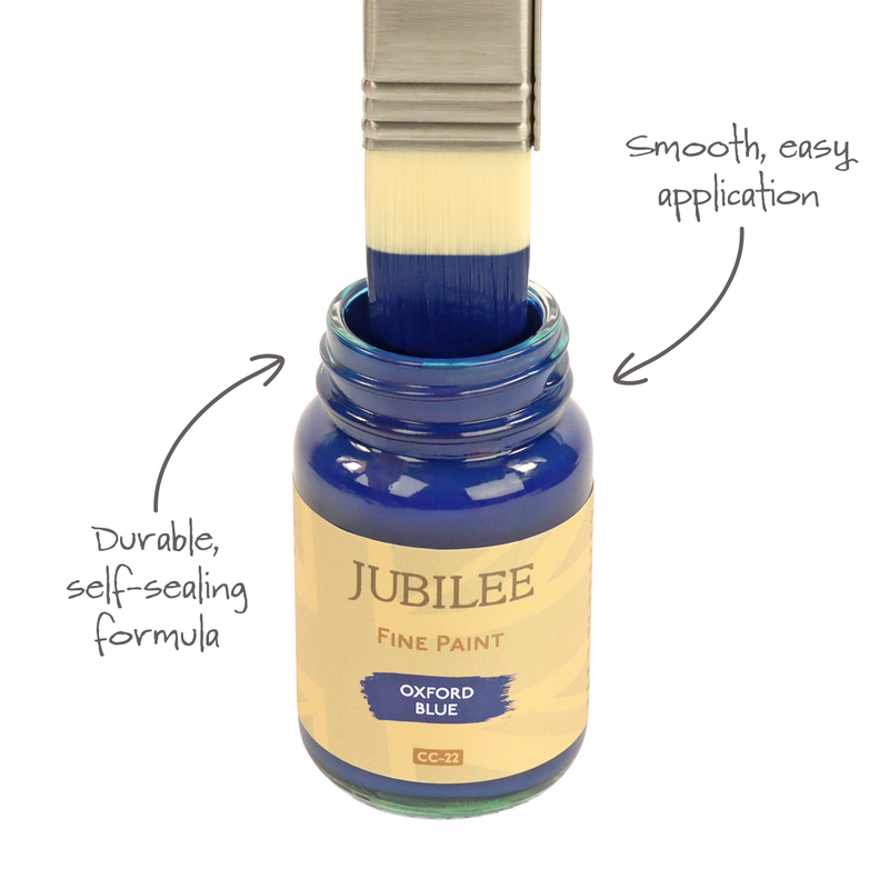 Jubilee Fine Paint jar with a brush dipping into it, labelled 'Durable, self-scaling formula' and 'Smooth, easy application'.