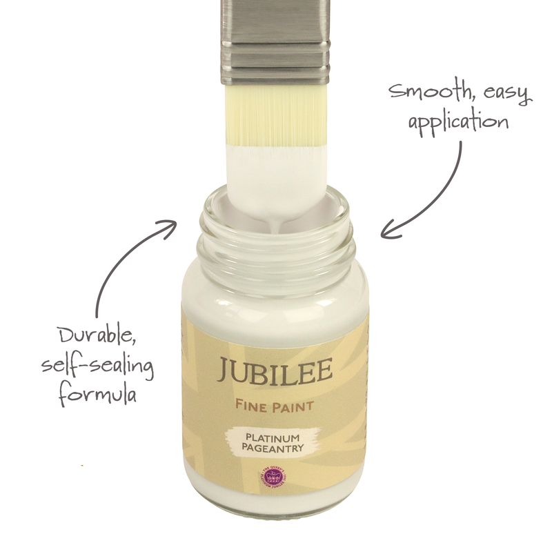 Jubilee Fine Paint bottle with brush and text highlighting features on a white background