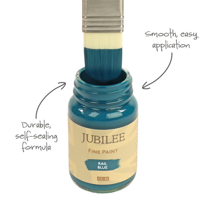 Jubilee Fine Paint jar with a brush dipping into it, labelled 'Durable, self-scaling formula' and 'Smooth, easy application'.