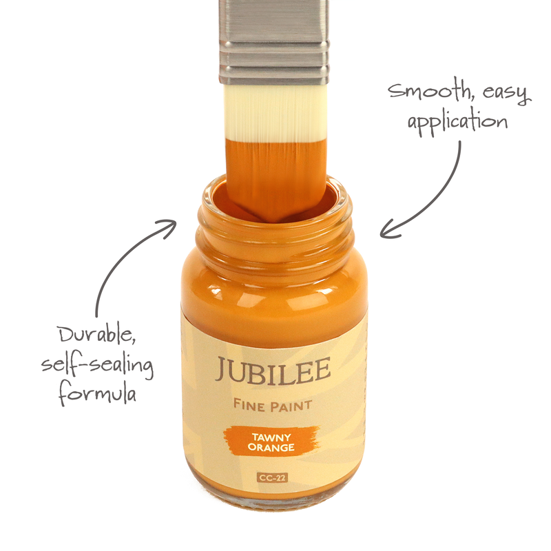 Jubilee Fine Paint jar with a brush applying paint, labeled 'Tawny Orange'.