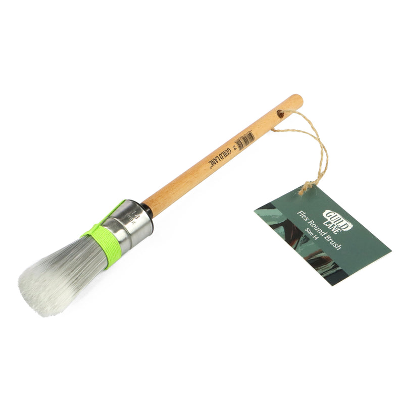 Paint brush with wooden handle and metal ferrule on a white background, featuring a Guild Lane brand tag.