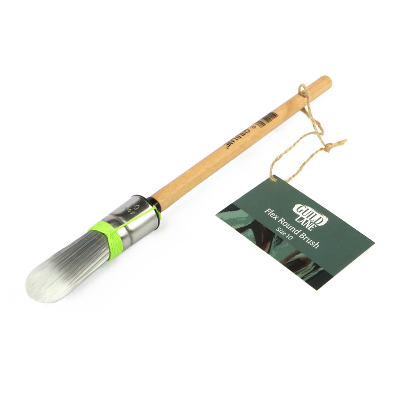 Paintbrush with a wooden handle and metal ferrule, attached to a Guild Lane branded card on a white background.