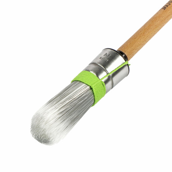 Flex Brush with wooden handle and metal ferrule on a white background