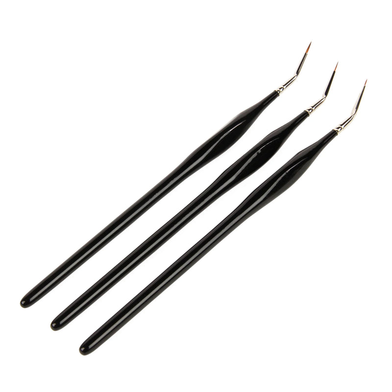 Three black paintbrushes with gold ferrules on a white background