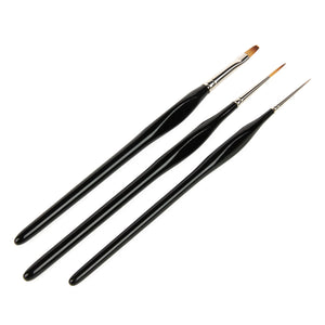 
                      
                        Three black paintbrushes of varying sizes on a white background
                      
                    
