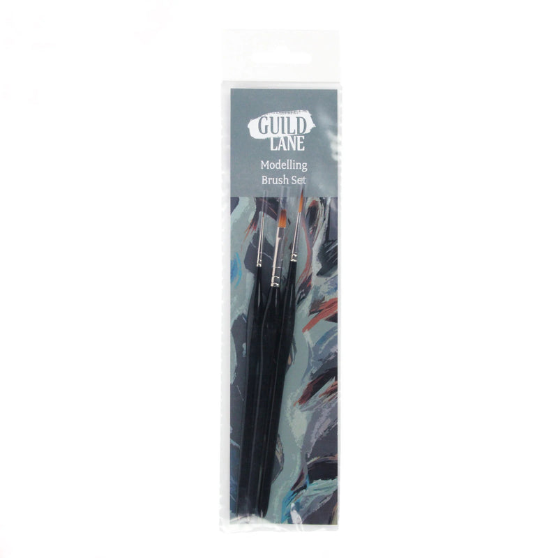 Set of brushes in packet on white background