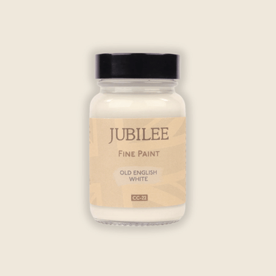 Jar of Jubilee Fine Paint in Old English White on a beige background