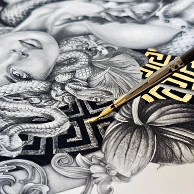 Artistic depiction of a face with intricate patterns, including a snake and floral elements, with a pen on top.