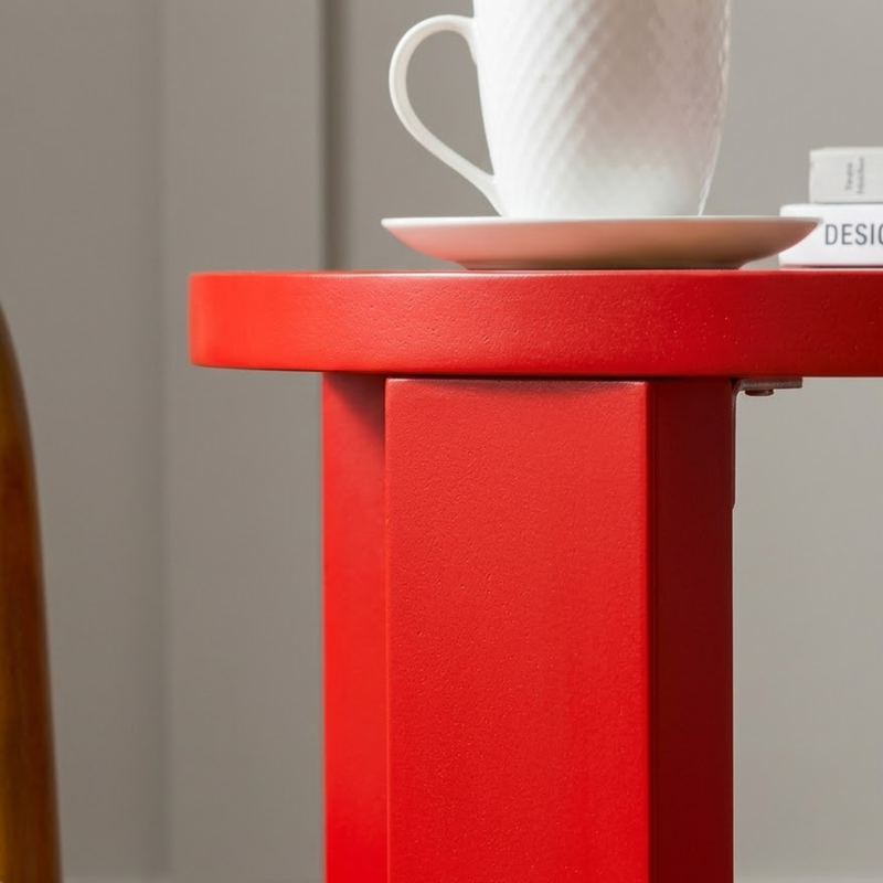 Close up of a painted corner of a side table in Pillar Box Red Jubilee paint