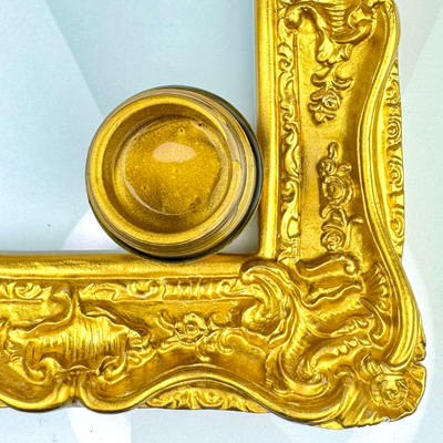 Gold ornate frame on a white background