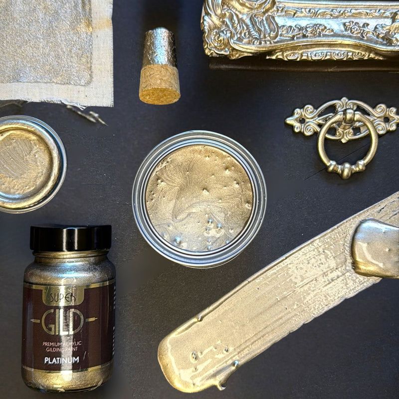 Super GILD Platinum  metallic painted items and materials on a dark surface