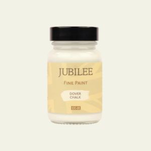 Jubilee Fine Paint jar with black lid on a beige background