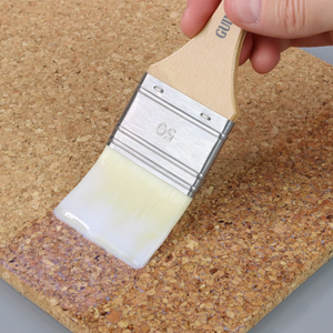 
                      
                        Cork material being coated in top coat
                      
                    