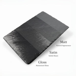 
                      
                        Black slate sample with Matt, Satin, and Gloss finishes on a white background
                      
                    