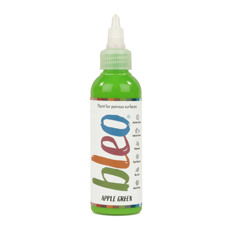 A bottle containing coloured gel paint, on a white background of bleo apple green