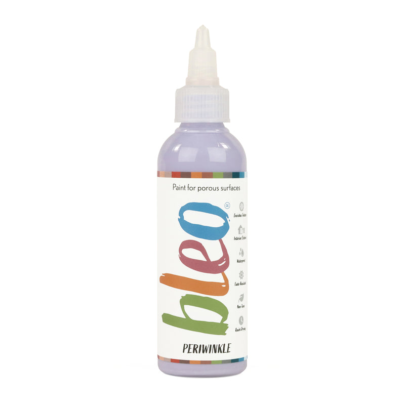 A bottle containing coloured gel paint, on a white background of bleo periwinkle